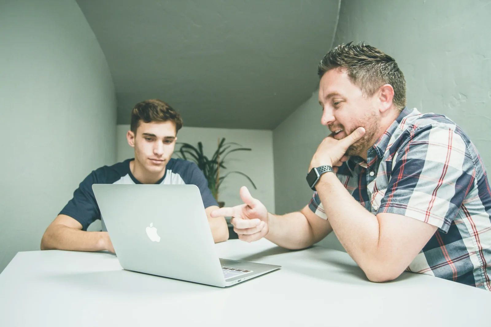 two man discussing: Product Photography Pricing