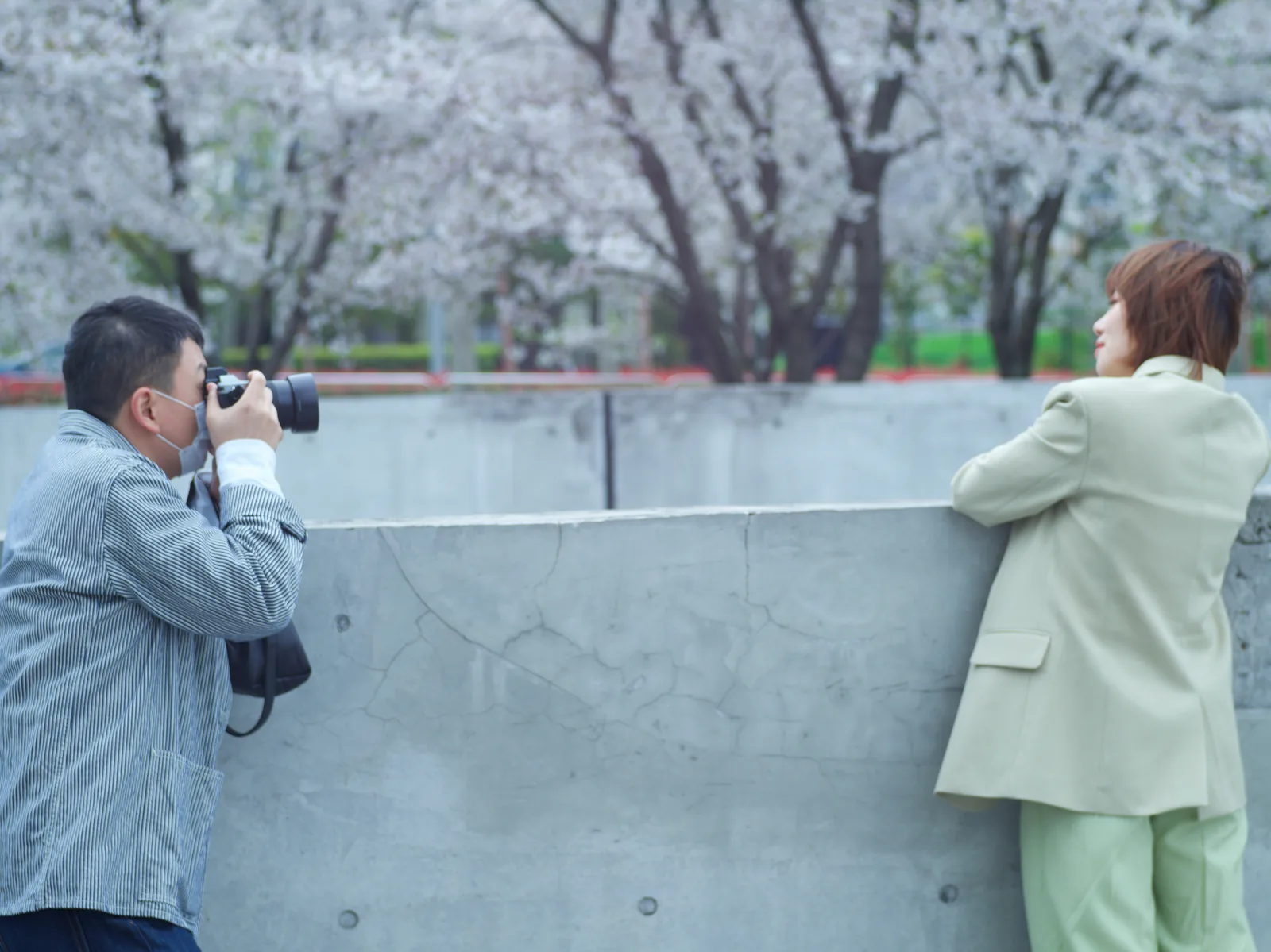 man taking picture: Best Way to Photograph Clothing