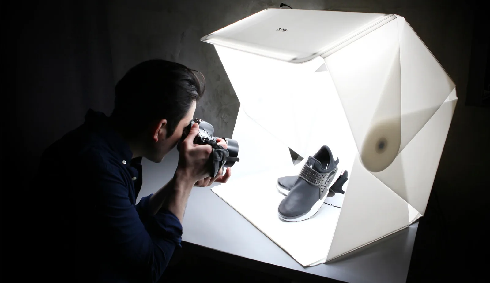 man taking pictures: Creative Product Photography Ideas At Home