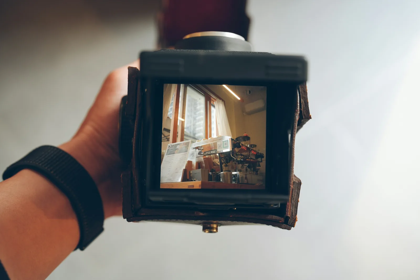 person taking picture: Product Photography At Home