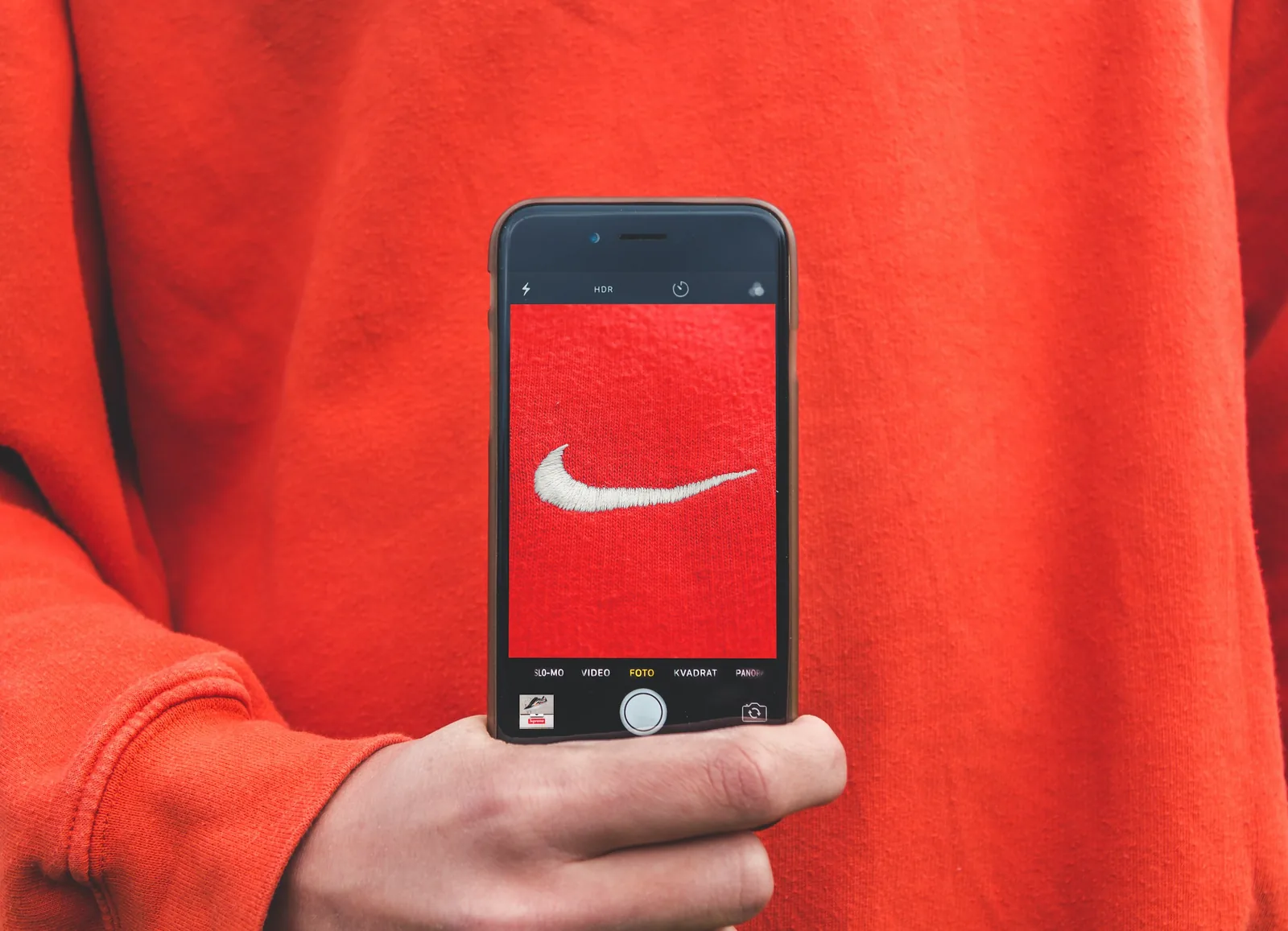 man taking a photo: Product Photography Ideas