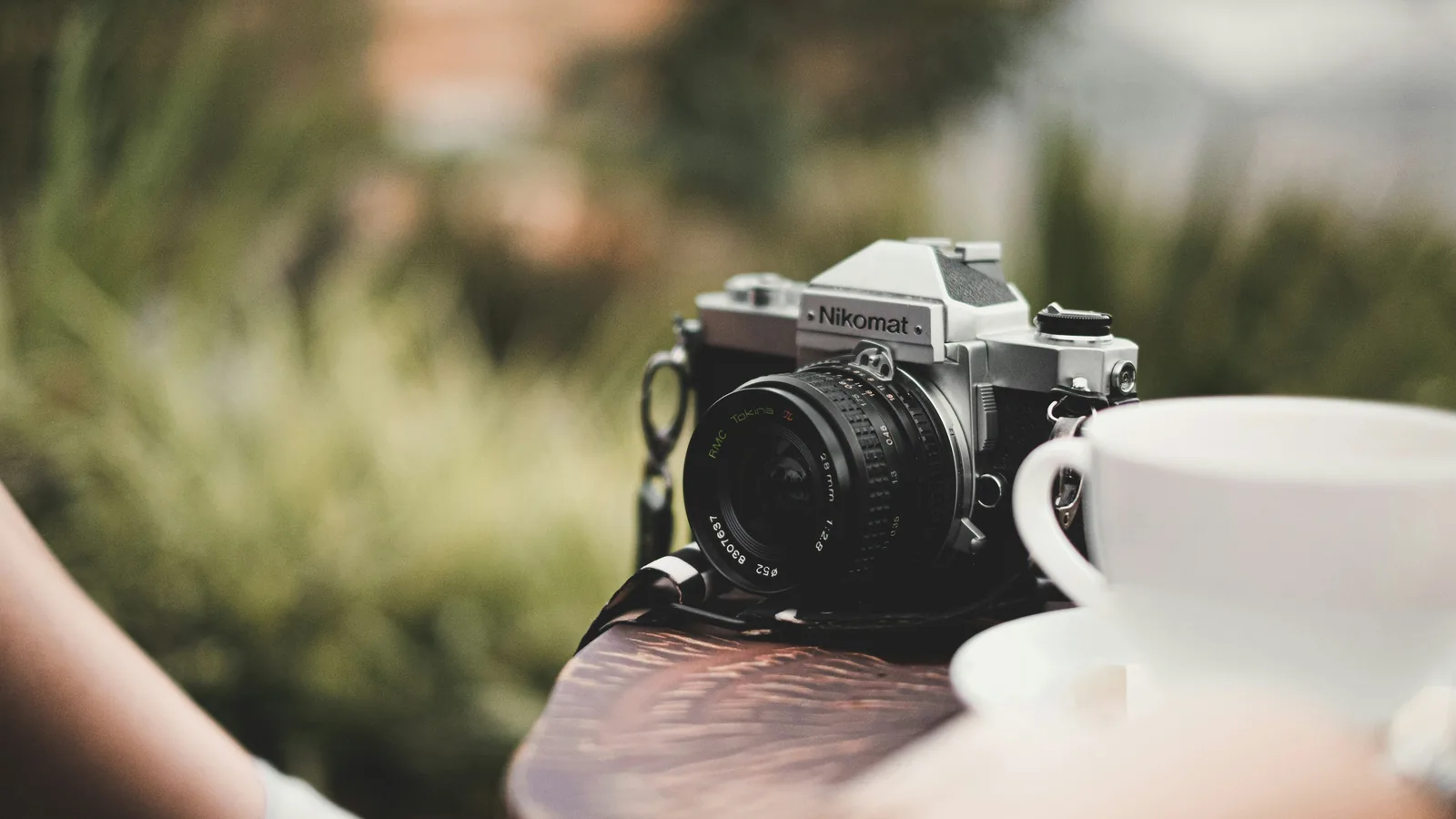 camera on a table: How To Shoot Product Photography