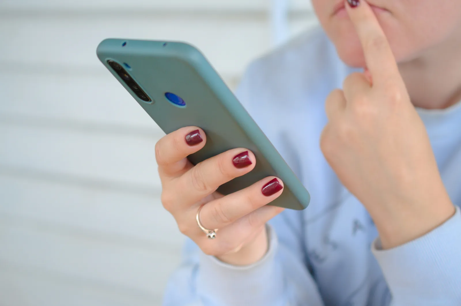 person on phone: Add to Cart Conversion Rate