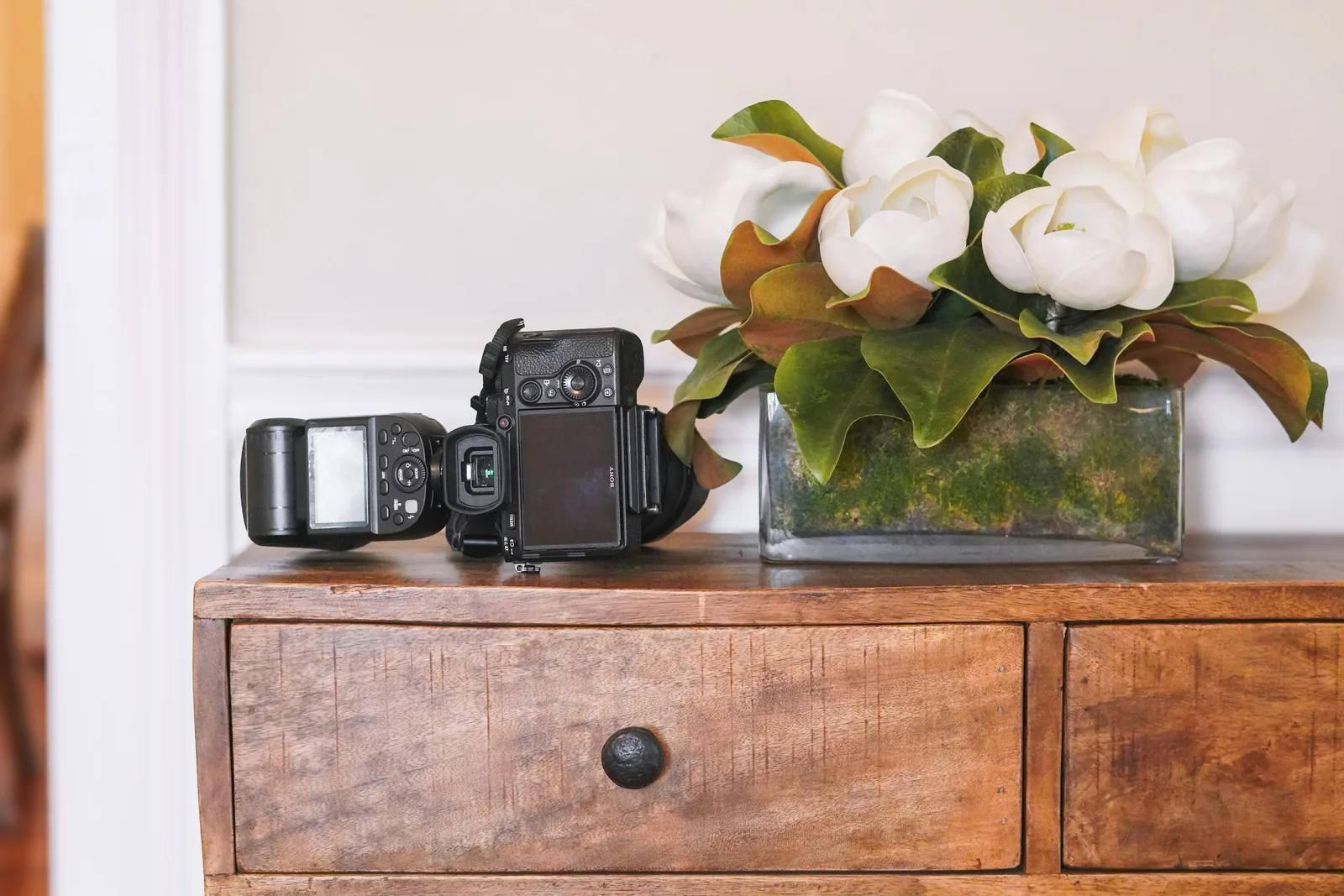 camera on a table: Product Photography At Home