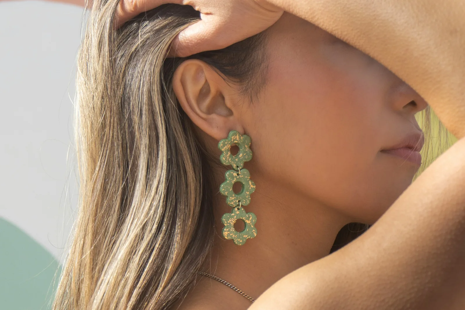 woman showing off her earrings, Earring Photography
